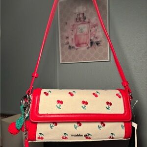 Madden Girl Beige Cherry-Print Crossbody Bag with Red Trim